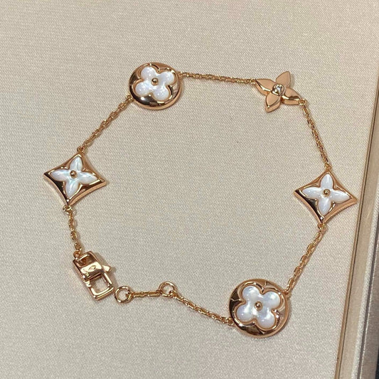 [Gaonasi]STAR AND SUN 5 MOTIF MOP PINK GOLD BRACELET