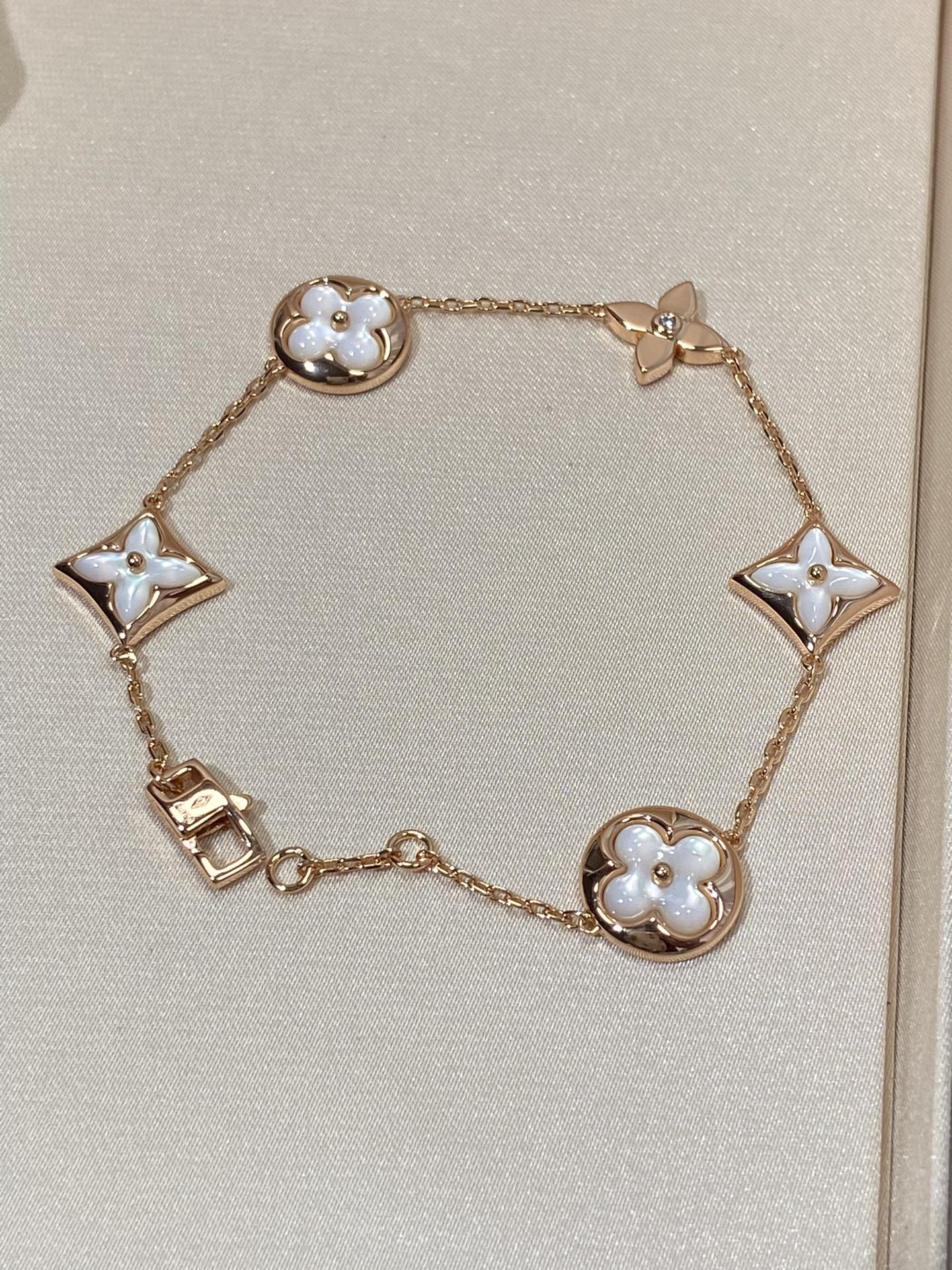 [Gaonasi]STAR AND SUN 5 MOTIF MOP PINK GOLD BRACELET