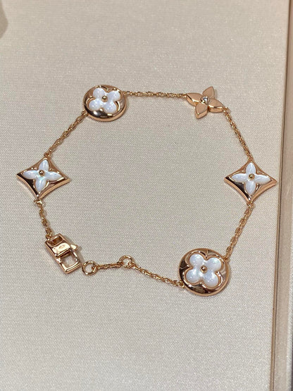 [Gaonasi]STAR AND SUN 5 MOTIF MOP PINK GOLD BRACELET
