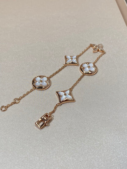 [Gaonasi]STAR AND SUN 5 MOTIF MOP PINK GOLD BRACELET
