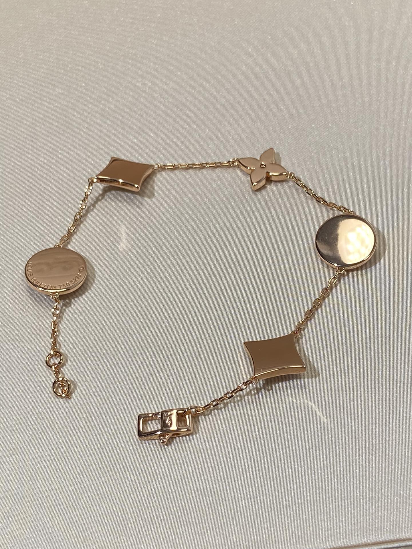 [Gaonasi]STAR AND SUN 5 MOTIF MOP PINK GOLD BRACELET