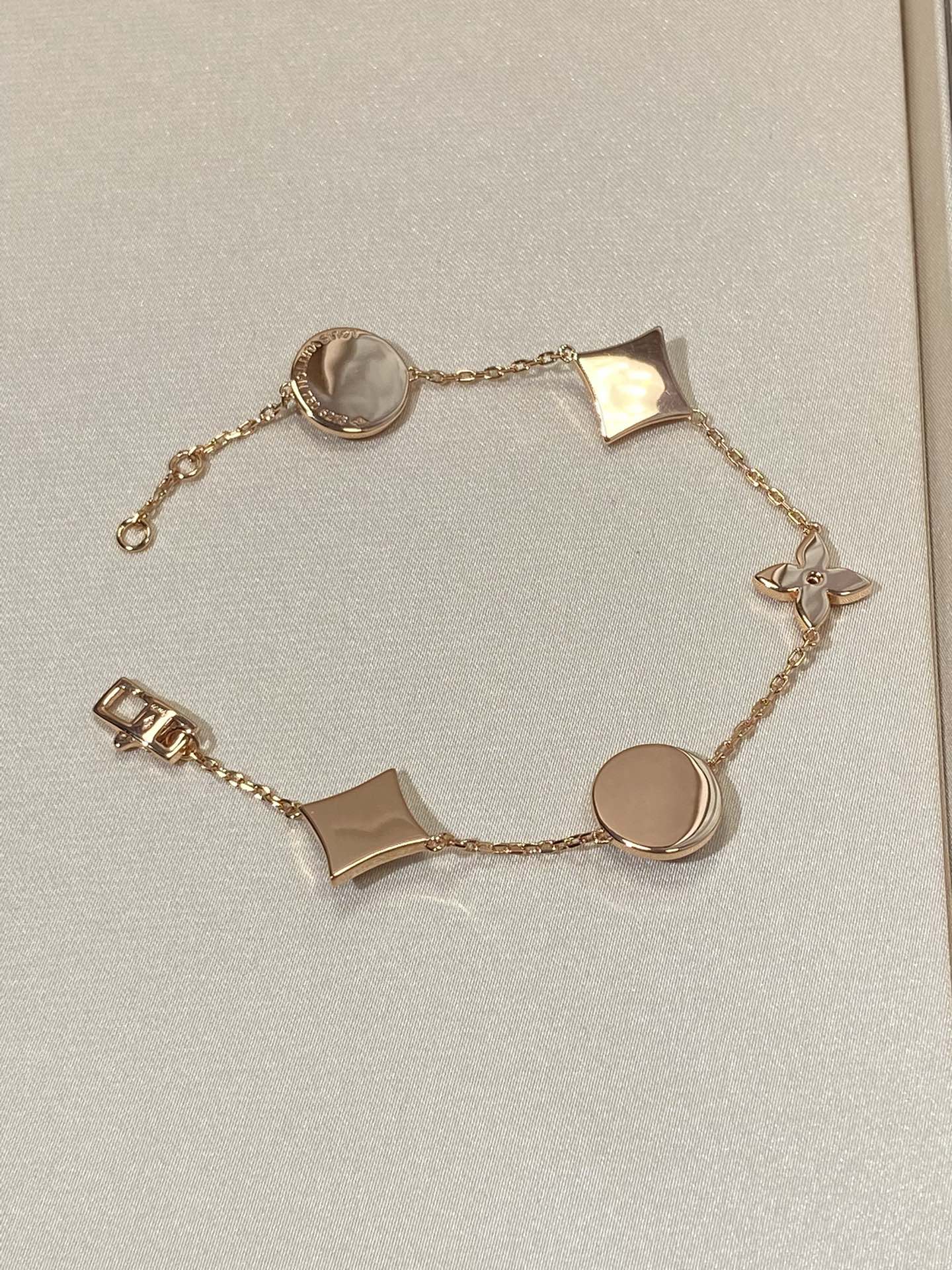 [Gaonasi]STAR AND SUN 5 MOTIF MOP PINK GOLD BRACELET