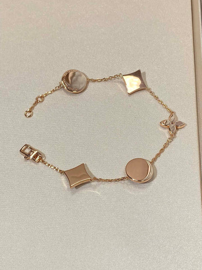 [Gaonasi]STAR AND SUN 5 MOTIF MOP PINK GOLD BRACELET