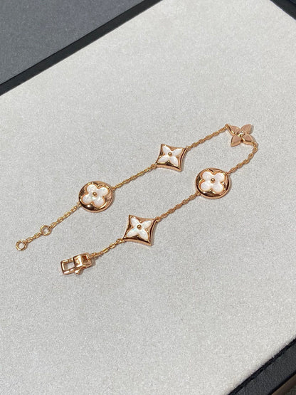 [Gaonasi]STAR AND SUN 5 MOTIF MOP PINK GOLD BRACELET