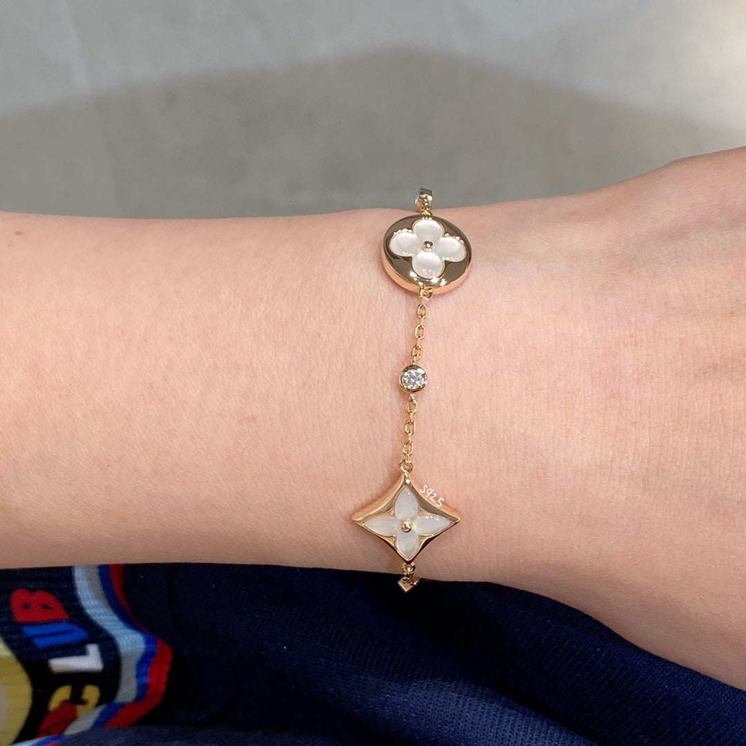 [Gaonasi]STAR AND SUN 4 MOTIF WHITE MOP PINK GOLD BRACELET